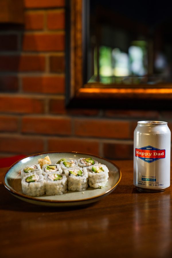 Crispy Rice sushi platter with Happy Dad seltzer